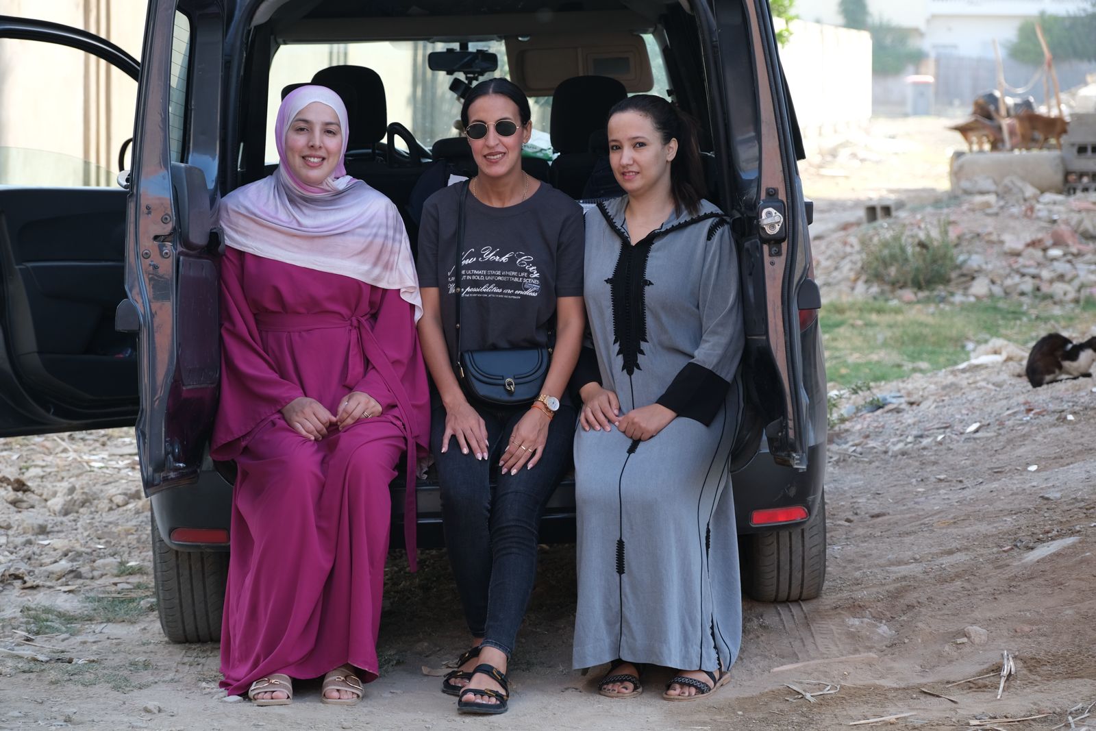 Three volunteers ready for a feeding round
